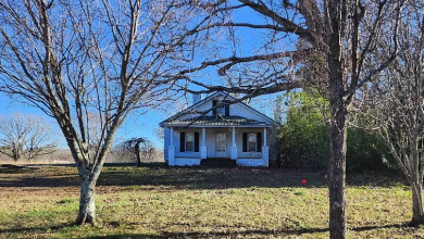 Photo of Fixer Upper Alert! Almost two acres in North Carolina. $135,000