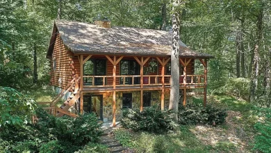 Photo of Beautiful Custom Log Home built by The Pelc Brothers Drive back the lane of your private 10+ acres offering pastures,