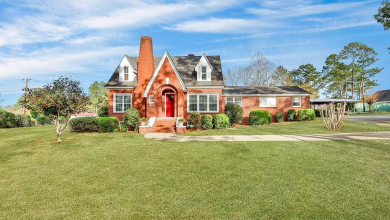 Photo of Curb appeal and pretty chandeliers! Circa 1938. One acre in Georgia. $249,900